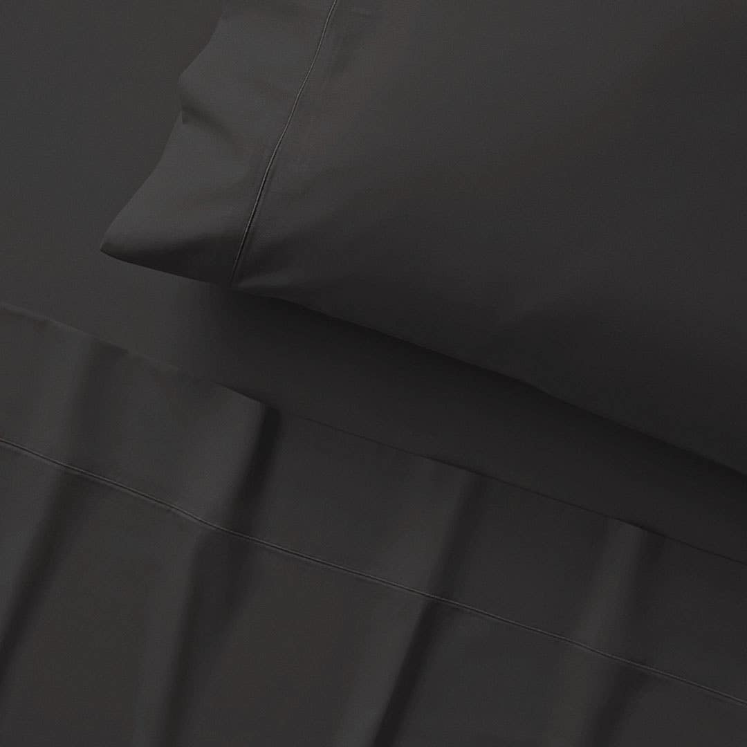 https://s3-ap-southeast-2.amazonaws.com/fusionfactory.commerceconnect.bbnt.production/pim_media/000/153/474/CH-S24-SS-Haven-Charcoal-Pillow-Detail_SI.jpg?1694493252