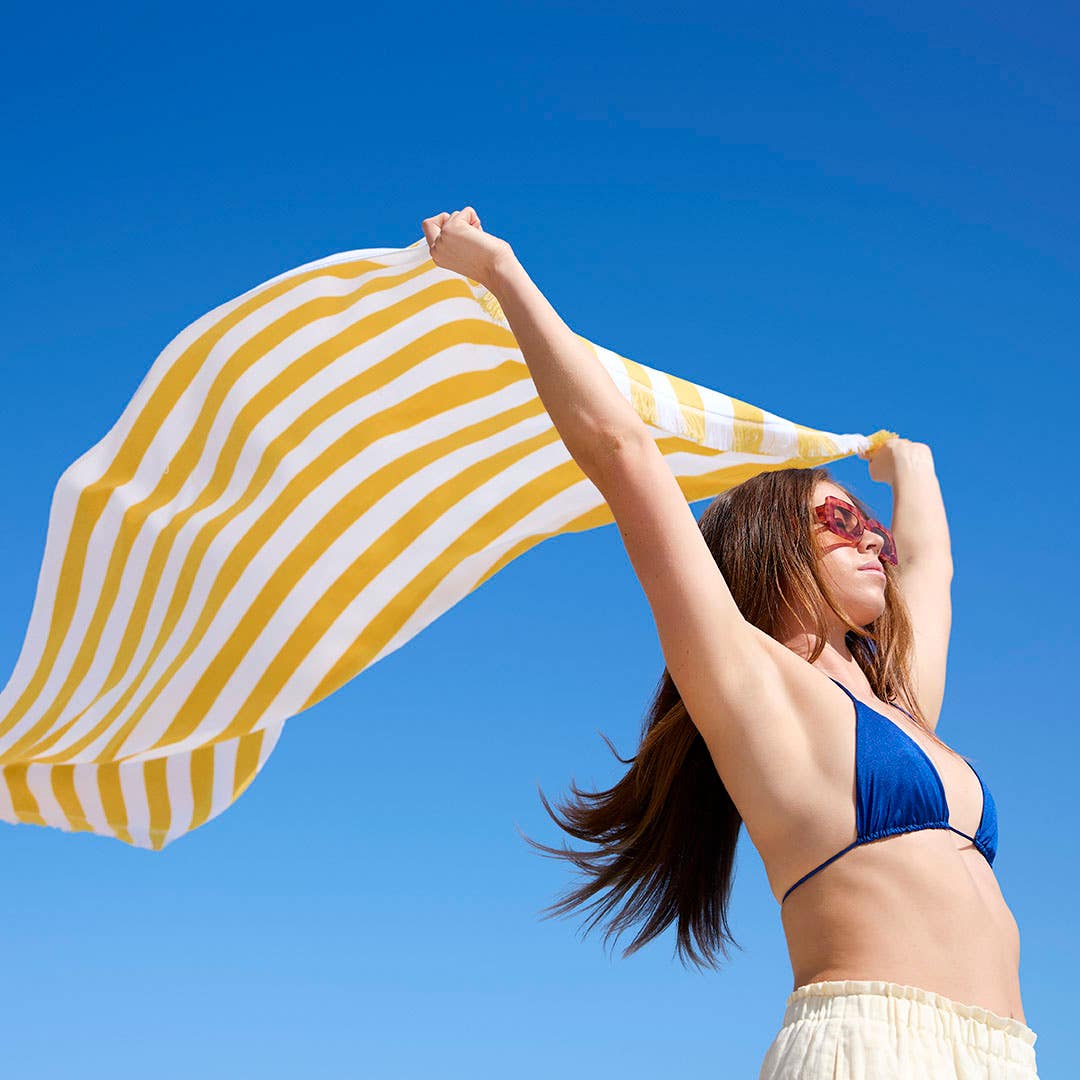 https://s3-ap-southeast-2.amazonaws.com/fusionfactory.commerceconnect.bbnt.production/pim_media/000/204/051/CH_Summer_S25-26_LS_Beach_Towels-Talent-Cilla-Yellow_SI.jpg?1762474060