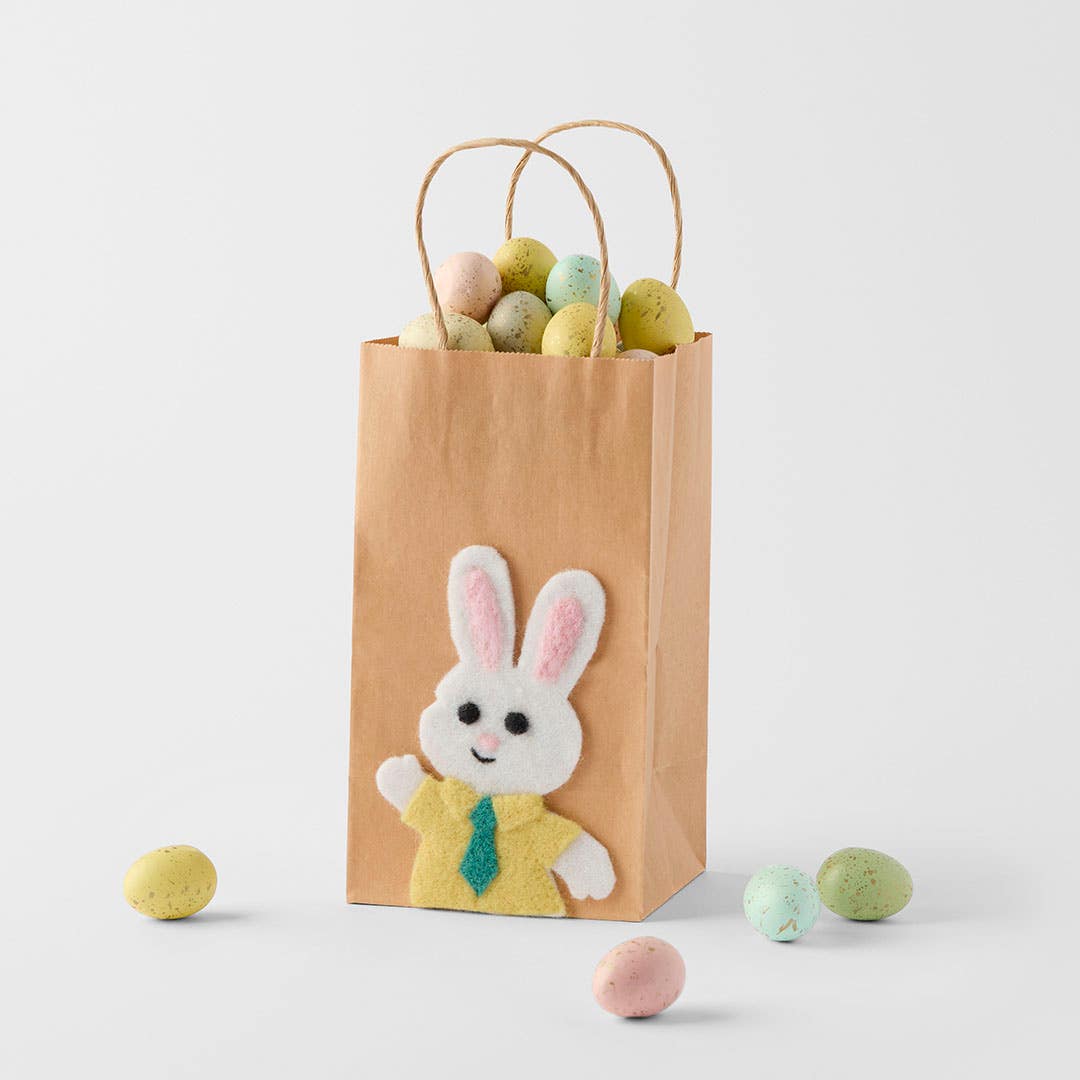 https://s3-ap-southeast-2.amazonaws.com/fusionfactory.commerceconnect.bbnt.production/pim_media/000/204/280/M_F_Easter26_Paper-Bag-w-Boy-Bunny_Yellow_26640601_SCALE_SI.jpg?1762925251