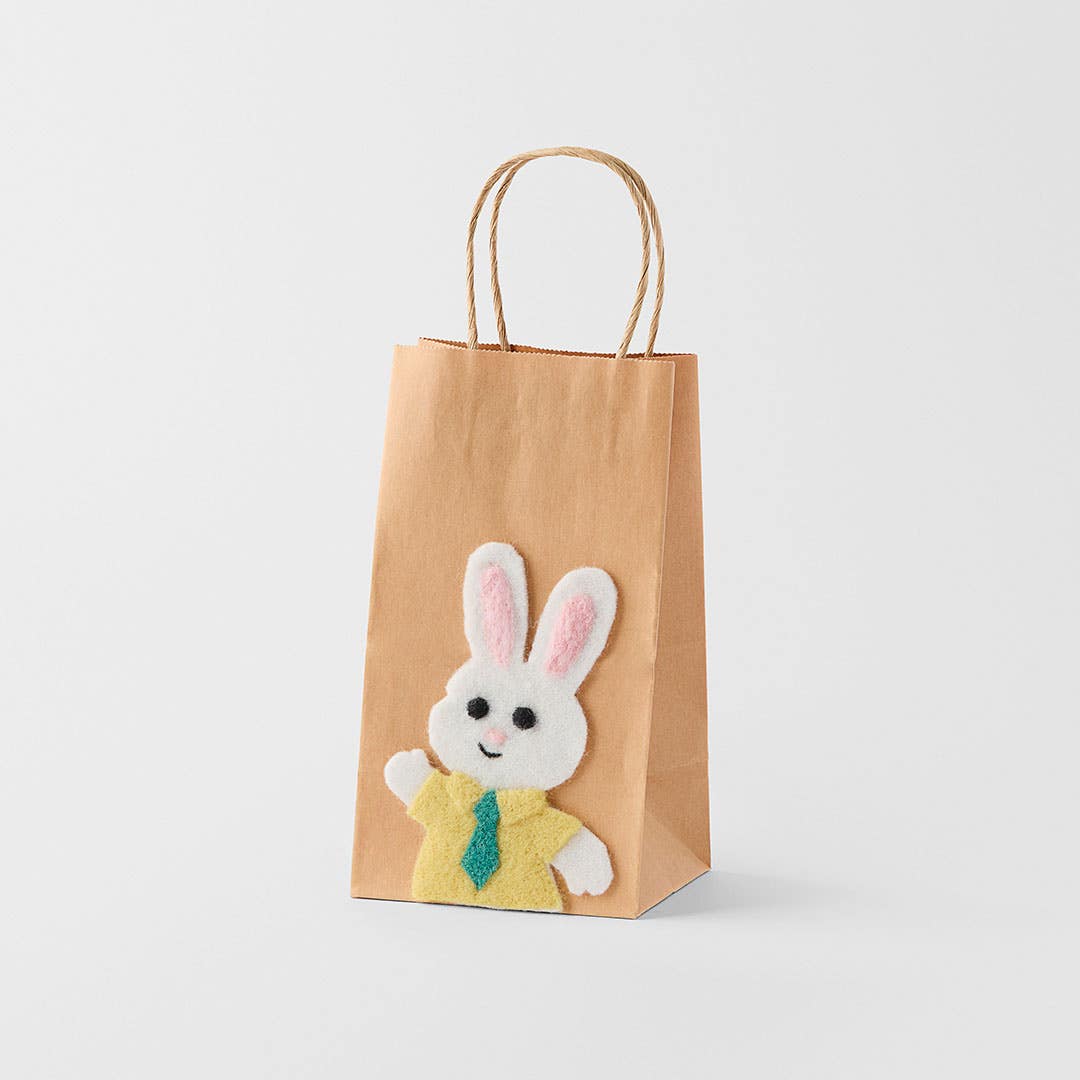 https://s3-ap-southeast-2.amazonaws.com/fusionfactory.commerceconnect.bbnt.production/pim_media/000/204/281/M_F_Easter26_Paper-Bag-w-Boy-Bunny_Yellow_26640601_SI.jpg?1762925252