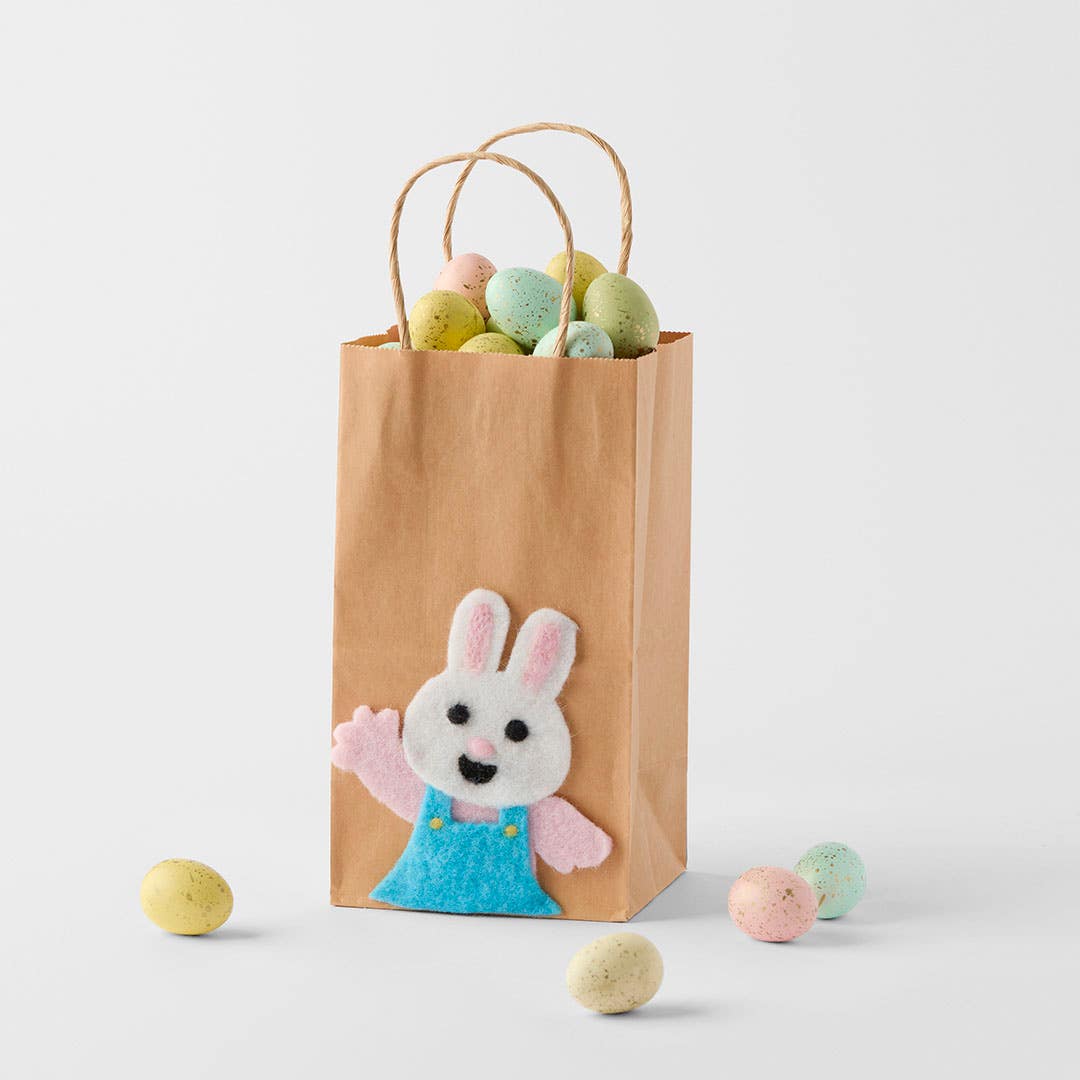 https://s3-ap-southeast-2.amazonaws.com/fusionfactory.commerceconnect.bbnt.production/pim_media/000/204/282/M_F_Easter26_Paper-Bag-w-Girl-Bunny_Blue_26640401_SCALE_SI.jpg?1762926141