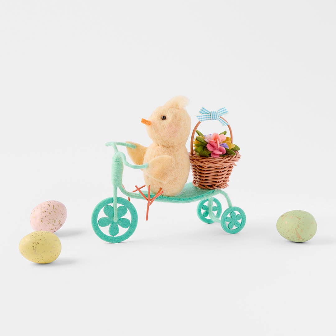 https://s3-ap-southeast-2.amazonaws.com/fusionfactory.commerceconnect.bbnt.production/pim_media/000/204/894/M_F_Easter26_T2-Chick--on-Bike-w-Basket_Yellow-Blue_26616201_SCALE_SI.jpg?1764129769