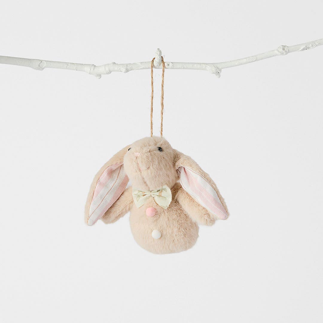https://s3-ap-southeast-2.amazonaws.com/fusionfactory.commerceconnect.bbnt.production/pim_media/000/204/973/M_F_Easter26_T2-Plush-Bunny-Dec-w-Bow-Tie_Stone_26631201_SI.jpg?1764135792