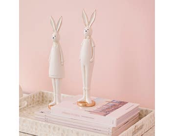 https://s3-ap-southeast-2.amazonaws.com/fusionfactory.commerceconnect.bbnt.production/pim_media/000/186/123/M_F_Easter_E25_LS_Studio_Bunny-Bliss_Standing-Decs_Set_Pink-Bunny-Dress-Overalls_LS_SI.jpg?1735877119