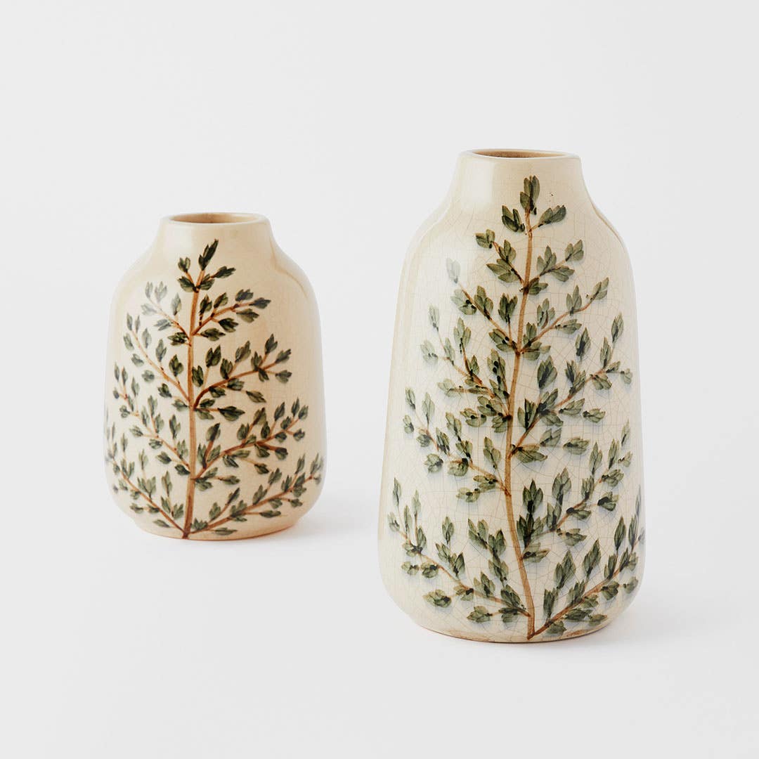 https://s3-ap-southeast-2.amazonaws.com/fusionfactory.commerceconnect.bbnt.production/pim_media/000/152/150/M_F_Evergreen_Ceramic_Vase_Green_Beige_22940_R_SI.jpg?1690850375