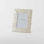 https://s3-ap-southeast-2.amazonaws.com/fusionfactory.commerceconnect.bbnt.production/pim_media/000/169/411/M_F_Issey-Inlay-Photo-Frame-5x7_Ivory_25881601_SI.jpg?1725601904