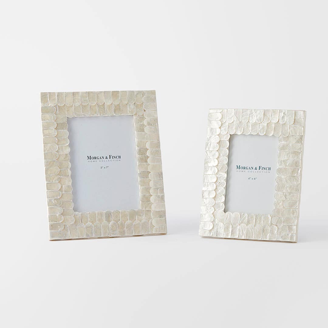 https://s3-ap-southeast-2.amazonaws.com/fusionfactory.commerceconnect.bbnt.production/pim_media/000/169/411/M_F_Issey-Inlay-Photo-Frame-5x7_Ivory_25881601_SI.jpg?1725601904