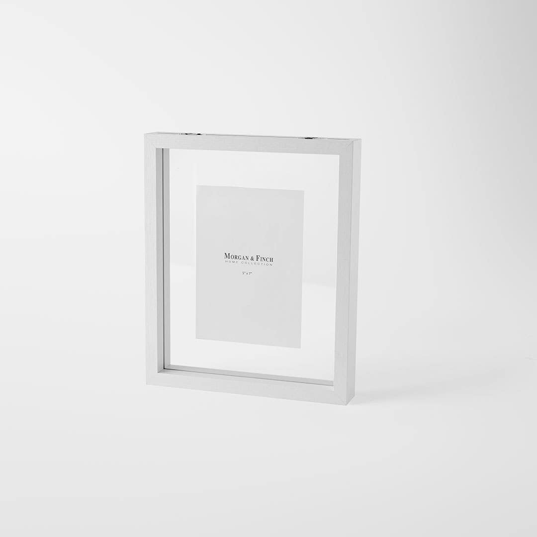 https://s3-ap-southeast-2.amazonaws.com/fusionfactory.commerceconnect.bbnt.production/pim_media/000/191/213/M_F_Loft-5x7-Photo-Frame_White_21695202_SI.jpg?1742529887