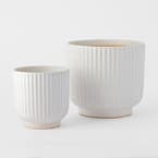 https://s3-ap-southeast-2.amazonaws.com/fusionfactory.commerceconnect.bbnt.production/pim_media/000/184/903/M_F_Ribbed-Ceramic-Pot_Off-White_26123_R_SI.jpg?1734668299