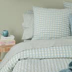 https://s3-ap-southeast-2.amazonaws.com/fusionfactory.commerceconnect.bbnt.production/pim_media/000/164/518/M_F_S24-25_Bedlinen_BOP_Leah_Blue_QQC_Mareting_Detail-02_SI.jpg?1718081329