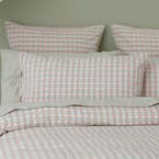 https://s3-ap-southeast-2.amazonaws.com/fusionfactory.commerceconnect.bbnt.production/pim_media/000/164/536/M_F_S24-25_Bedlinen_BOP_Leah_Blush_QQC_Pillow_SI.jpg?1718084902