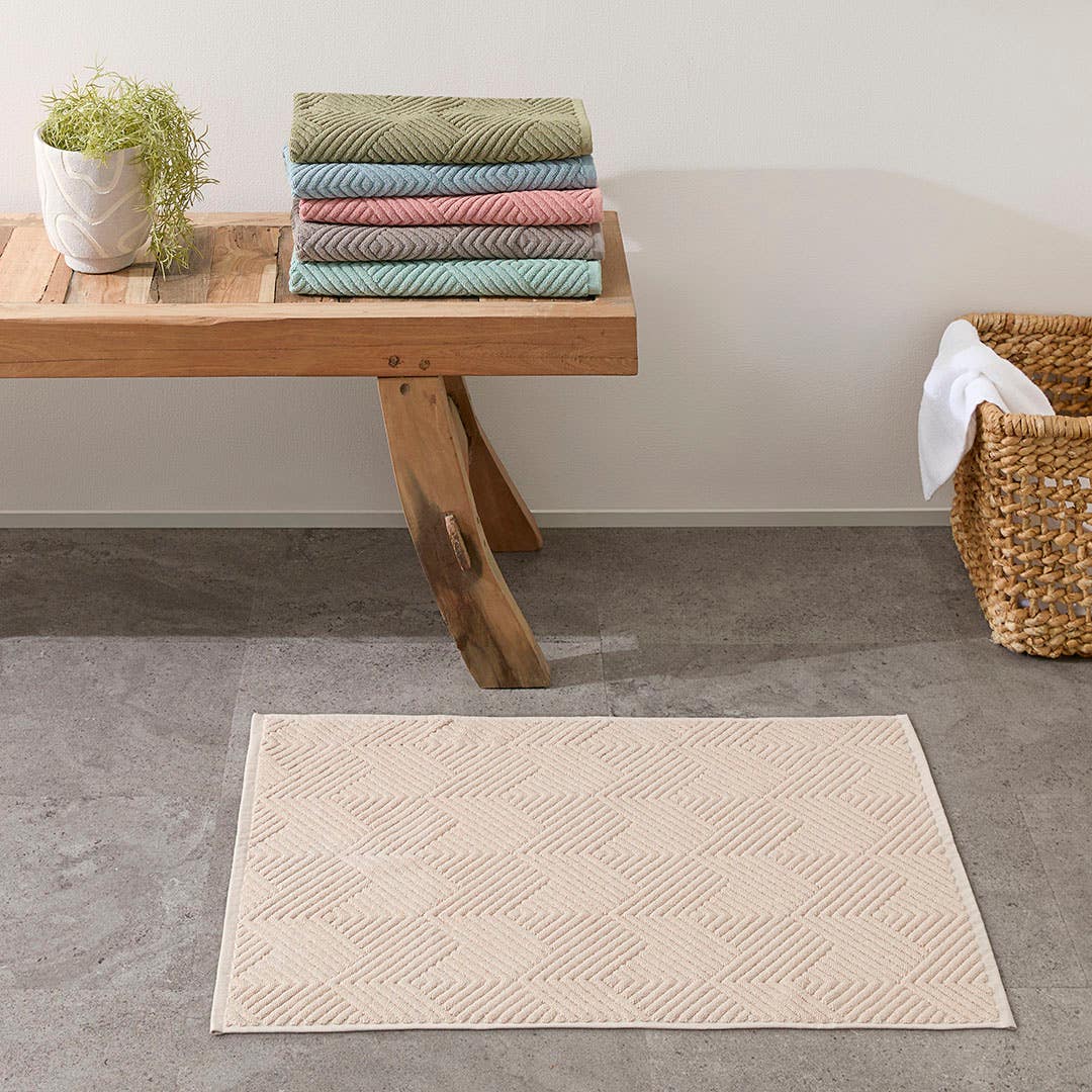 https://s3-ap-southeast-2.amazonaws.com/fusionfactory.commerceconnect.bbnt.production/pim_media/000/174/206/M_F_S24-25_Summer_LS_Studio_Bathmats-Kinsley_BM-Oatmeal.jpg?1729818389
