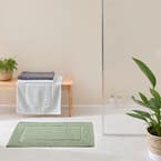 https://s3-ap-southeast-2.amazonaws.com/fusionfactory.commerceconnect.bbnt.production/pim_media/000/174/393/M_F_S24-25_Summer_LS_Studio_Bathmats_Piermont_BM_Khaki_SI.jpg?1730096191