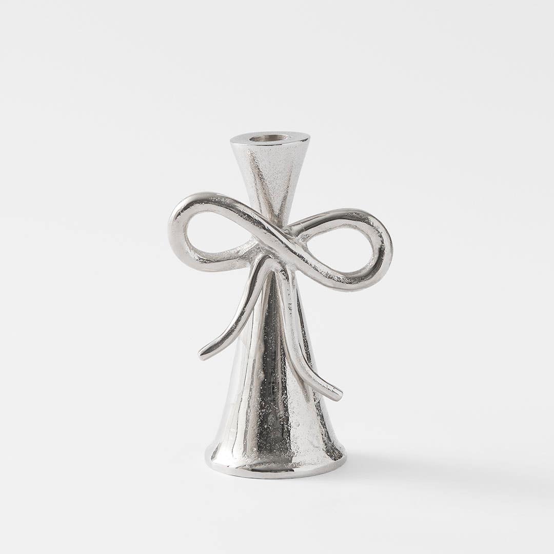 https://s3-ap-southeast-2.amazonaws.com/fusionfactory.commerceconnect.bbnt.production/pim_media/000/203/286/M_F_S25-26_Bow-Metal-Candle-Holder-Lrg_Silver_26599601_SI.jpg?1761194484