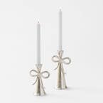 https://s3-ap-southeast-2.amazonaws.com/fusionfactory.commerceconnect.bbnt.production/pim_media/000/203/288/M_F_S25-26_Bow-Metal-Candle-Holder-Range_Silver_26599_R_PLATE_SI.jpg?1761194484