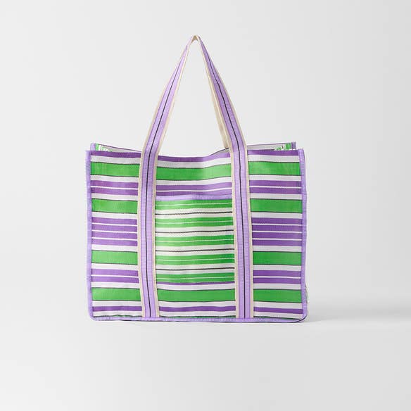 https://s3-ap-southeast-2.amazonaws.com/fusionfactory.commerceconnect.bbnt.production/pim_media/000/202/548/M_F_S25-26_Keyra-Tote-bag_Green-Purple_26526901_SI.jpg?1759729167