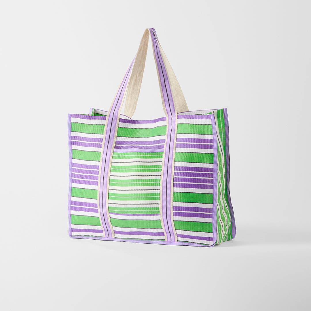 https://s3-ap-southeast-2.amazonaws.com/fusionfactory.commerceconnect.bbnt.production/pim_media/000/202/549/M_F_S25-26_Keyra-Tote-bag_Green-Purple_26526901_V2_SI.jpg?1759729167