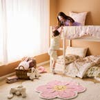 https://s3-ap-southeast-2.amazonaws.com/fusionfactory.commerceconnect.bbnt.production/pim_media/000/204/740/M_F_S25-26_LS_Kids_Range_Cottontail_Flower_Rug_V2_SI.jpg?1764025980
