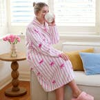 https://s3-ap-southeast-2.amazonaws.com/fusionfactory.commerceconnect.bbnt.production/pim_media/000/202/139/M_F_S25-26_Summer-PJs_LS_Adult_Sandy-Printed_Plush_Robe_V1_SI.jpg?1759452390