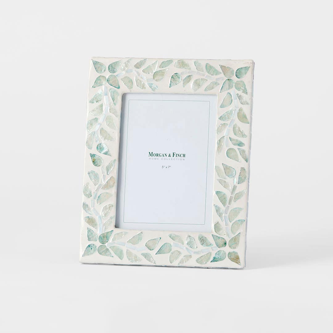 https://s3-ap-southeast-2.amazonaws.com/fusionfactory.commerceconnect.bbnt.production/pim_media/000/192/354/M_F_Sahara_Inlay_Frame_5x7_Teal_26165001_SI.jpg?1743471950