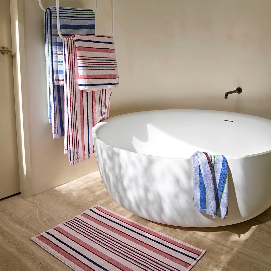 https://s3-ap-southeast-2.amazonaws.com/fusionfactory.commerceconnect.bbnt.production/pim_media/000/221/789/M_F_Summer-26_27_LS_Bathroom_Ultra_Stripe_Blue-Fig_Rose-Mulberry_V1_SI.jpg?1788834734