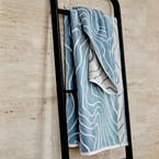 https://s3-ap-southeast-2.amazonaws.com/fusionfactory.commerceconnect.bbnt.production/pim_media/000/173/961/M_F_Summer_S24-25_LS_Location_Bathroom_Bath_Towel_BT_Franco_Soft_Blue_1.jpg?1729733525