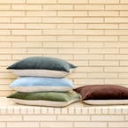 https://s3-ap-southeast-2.amazonaws.com/fusionfactory.commerceconnect.bbnt.production/pim_media/000/173/880/M_F_Summer_S24-25_LS_Location_Cushions_Range_Meera_Olive_Steel_Chambray_Cacao.jpg?1729725160