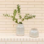 https://s3-ap-southeast-2.amazonaws.com/fusionfactory.commerceconnect.bbnt.production/pim_media/000/172/273/M_F_Summer_S24-25_LS_Location_Decorator_Helena_Ceramic_Vase_Tall_Squat_SI.jpg?1728533164