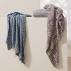 https://s3-ap-southeast-2.amazonaws.com/fusionfactory.commerceconnect.bbnt.production/pim_media/000/192/018/M_F_Summer_S24-25_Studio_Soft_Furniture_Moss_Throws_Range_SI.jpg?1743117134