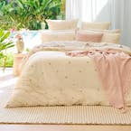 https://s3-ap-southeast-2.amazonaws.com/fusionfactory.commerceconnect.bbnt.production/pim_media/000/203/106/M_F_Summer_S25-26_LS_Bedlinen_Philippa_QQC_SI.jpg?1760676633