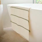 https://s3-ap-southeast-2.amazonaws.com/fusionfactory.commerceconnect.bbnt.production/pim_media/000/174/641/M_F_W24_LS_Bathroom-Henri_Stripe_Towel_Clay-Sami_Bathroom_Natural_Olive_SI.jpg?1730163132