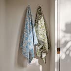 https://s3-ap-southeast-2.amazonaws.com/fusionfactory.commerceconnect.bbnt.production/pim_media/000/163/207/M_F_W24_LS_Bathroom_BT_Bird_Song_Blue_Green_1_SI.jpg?1714450490