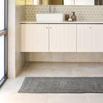 https://s3-ap-southeast-2.amazonaws.com/fusionfactory.commerceconnect.bbnt.production/pim_media/000/160/686/M_F_W24_LS_Bathroom_Runners_Braxton-Graphite_V1_SI.jpg?1708490446
