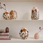 https://s3-ap-southeast-2.amazonaws.com/fusionfactory.commerceconnect.bbnt.production/pim_media/000/163/061/M_F_W24_LS_Decorator_Evergreen_Dana_Ceramic_Vase_Pippa_Glass_Gracie_Swirl_SI.jpg?1713747989