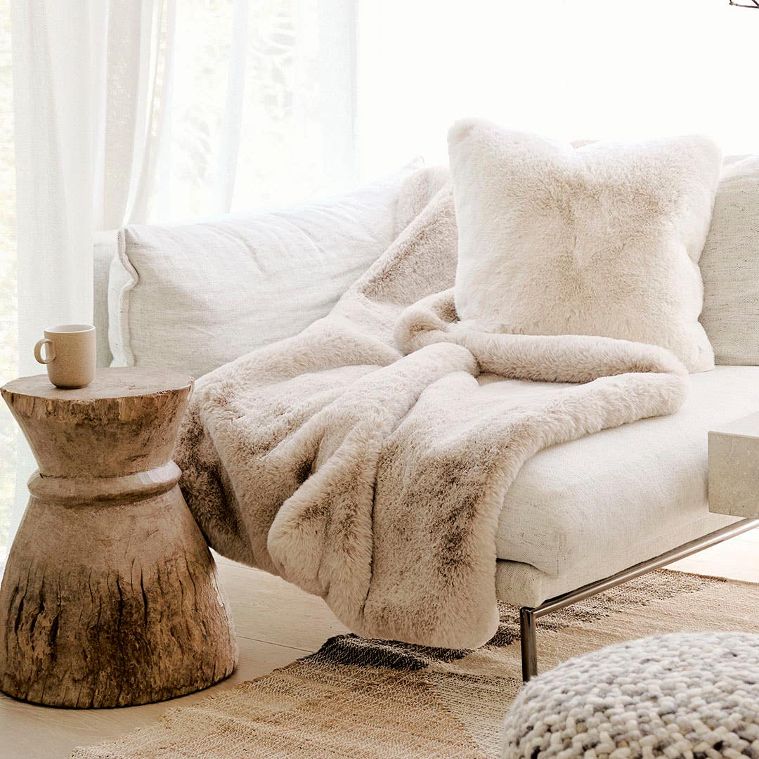 https://s3-ap-southeast-2.amazonaws.com/fusionfactory.commerceconnect.bbnt.production/pim_media/000/198/084/M_F_W24_LS_Throw_Cushion_Blanket_Faux_Fur_Luxury_Cream_Stone_SI.jpg?1753161663