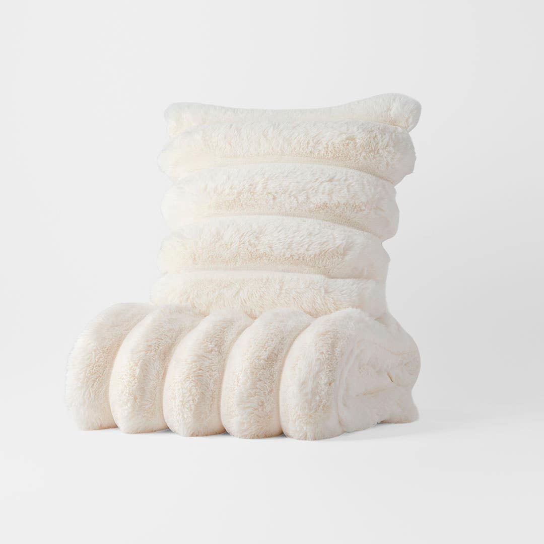 https://s3-ap-southeast-2.amazonaws.com/fusionfactory.commerceconnect.bbnt.production/pim_media/000/210/014/M_F_W26_Alaska-Fur-Throw-Cushion_Ivory_26895001_26895101_COMBO_SI.jpg?1771217947