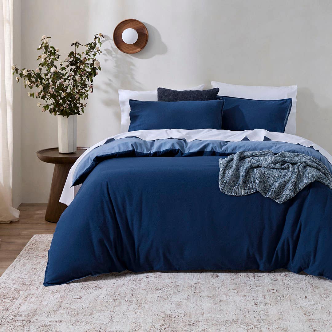 https://s3-ap-southeast-2.amazonaws.com/fusionfactory.commerceconnect.bbnt.production/pim_media/000/205/339/M_F_W26_Bedlinen_BOP_Fabian-Denim-Navy_QQC_SI.jpg?1765323375