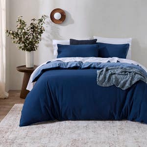 https://s3-ap-southeast-2.amazonaws.com/fusionfactory.commerceconnect.bbnt.production/pim_media/000/205/339/M_F_W26_Bedlinen_BOP_Fabian-Denim-Navy_QQC_SI.jpg?1765323375