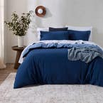 https://s3-ap-southeast-2.amazonaws.com/fusionfactory.commerceconnect.bbnt.production/pim_media/000/205/339/M_F_W26_Bedlinen_BOP_Fabian-Denim-Navy_QQC_SI.jpg?1765323375