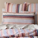 https://s3-ap-southeast-2.amazonaws.com/fusionfactory.commerceconnect.bbnt.production/pim_media/000/206/118/M_F_W26_Bedlinen_BOP_Fia_QQC_Pillow_SI.jpg?1767139820