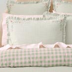 https://s3-ap-southeast-2.amazonaws.com/fusionfactory.commerceconnect.bbnt.production/pim_media/000/212/569/M_F_W26_Bedlinen_BOP_GIA_QQC_Pillow_SI.jpg?1776147211