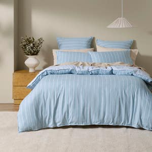 https://s3-ap-southeast-2.amazonaws.com/fusionfactory.commerceconnect.bbnt.production/pim_media/000/205/518/M_F_W26_Bedlinen_BOP_Lex-Smoke_Blue_QQC_V2_SI.jpg?1765330107