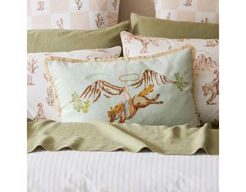 https://s3-ap-southeast-2.amazonaws.com/fusionfactory.commerceconnect.bbnt.production/pim_media/000/205/636/M_F_W26_Bedlinen_BOP_Wild_West_QQC_Wild_West_Cushion_SI.jpg?1765341077
