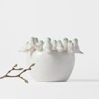 https://s3-ap-southeast-2.amazonaws.com/fusionfactory.commerceconnect.bbnt.production/pim_media/000/205/601/M_F_W26_Birdsong-Ceramic-Vase_White-Green_26911401_SCALE_SI.jpg?1765339663