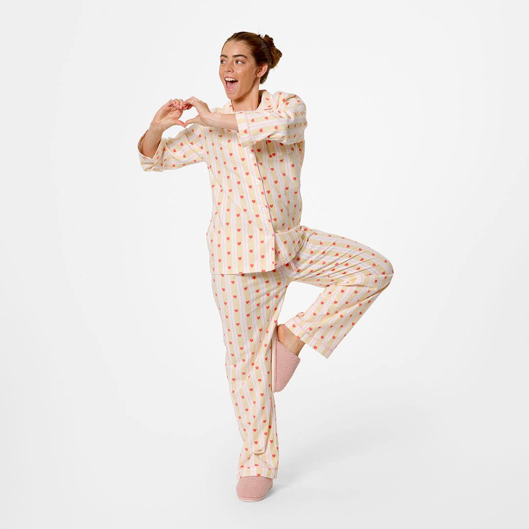 https://s3-ap-southeast-2.amazonaws.com/fusionfactory.commerceconnect.bbnt.production/pim_media/000/208/150/M_F_W26_Hearts-Flannel-PJs_SML_Yellow-Pink_26835001_SI.jpg?1770248690