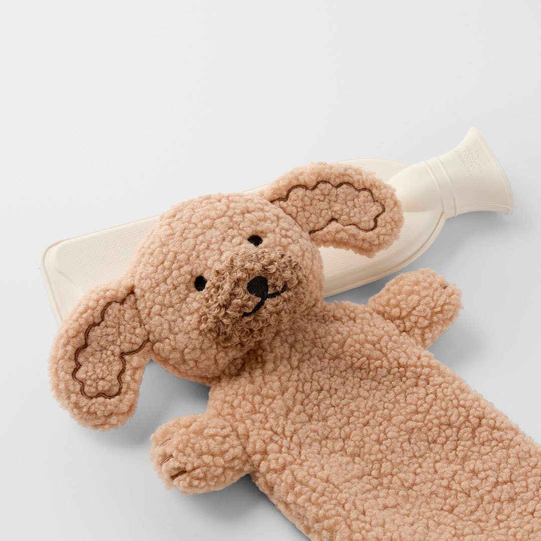 https://s3-ap-southeast-2.amazonaws.com/fusionfactory.commerceconnect.bbnt.production/pim_media/000/209/469/M_F_W26_Long-Hot-Water-Bottle-Ruby_Brown_26898501_Detail_SI.jpg?1770789567
