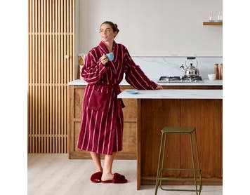 https://s3-ap-southeast-2.amazonaws.com/fusionfactory.commerceconnect.bbnt.production/pim_media/000/209/356/M_F_W26_PJs_Studio_LS_Combi_Robe_S-M_Mulberry_Rose_robe_SI.jpg?1770775638