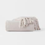 https://s3-ap-southeast-2.amazonaws.com/fusionfactory.commerceconnect.bbnt.production/pim_media/000/210/131/M_F_W26_Pia-Plush-Throw_Stone_26853701_SI.jpg?1771465292