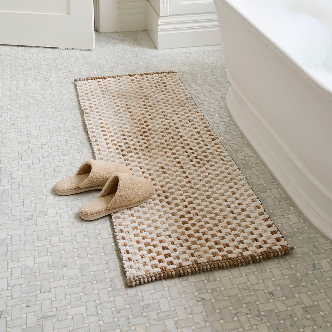 https://s3-ap-southeast-2.amazonaws.com/fusionfactory.commerceconnect.bbnt.production/pim_media/000/211/997/M_F_W26_Winter_Hampton_LS_Bathroom_Runner_Natural_SI.jpg?1774825784
