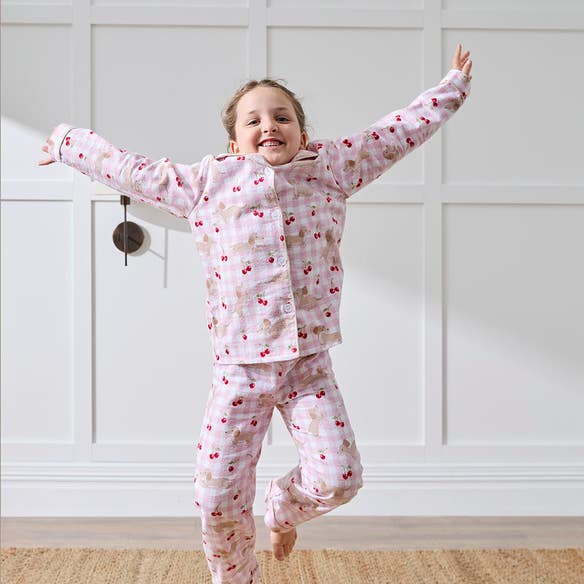 https://s3-ap-southeast-2.amazonaws.com/fusionfactory.commerceconnect.bbnt.production/pim_media/000/207/543/M_F_Winter_26_Studio_Kids_PJs-Flannel_Cherry_Dash-3_SI.jpg?1769487825